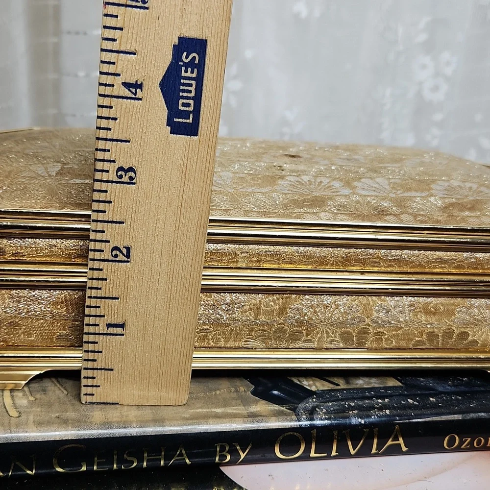Vintage or antique Musical jewelry box W/ gold or beige fabric/brocade exterior